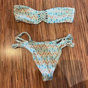 Frankie’s bikini teal design strapless top and thong bottom bikini